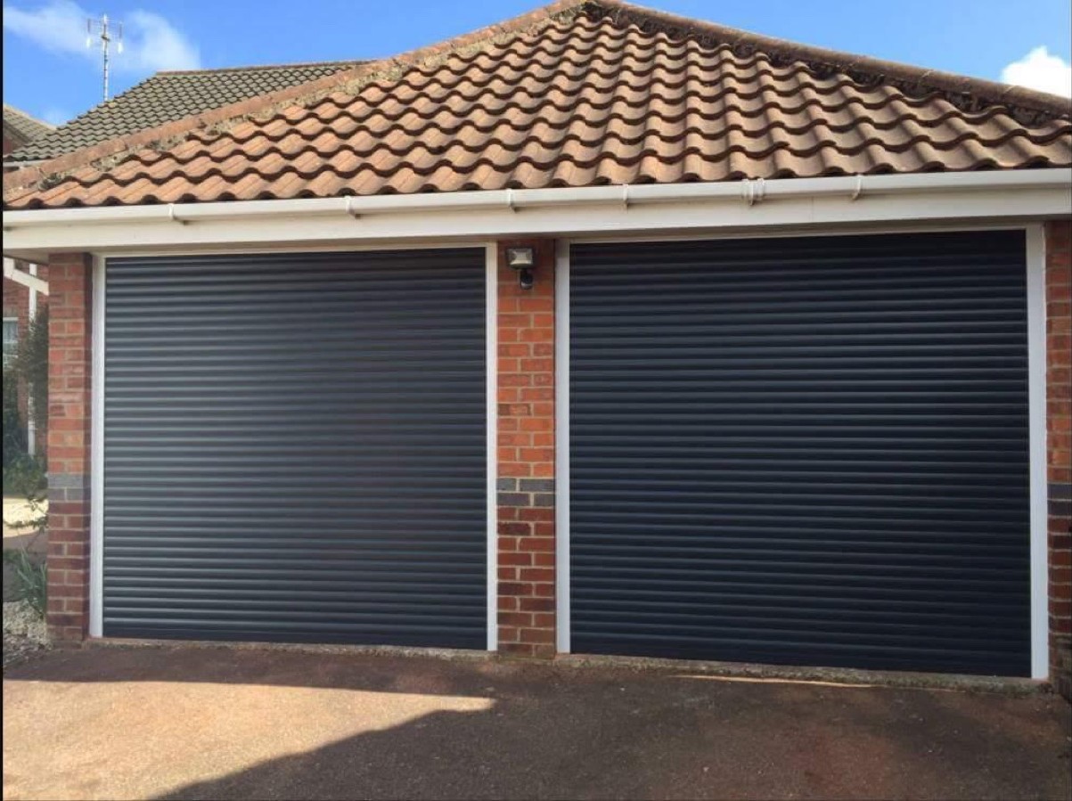 Double Garage Door Replacement — before